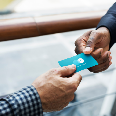 Business owners handing out business cards